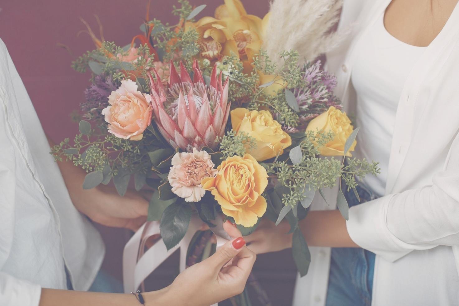 Behind-the-scenes look at our careful flower selection and arrangement process