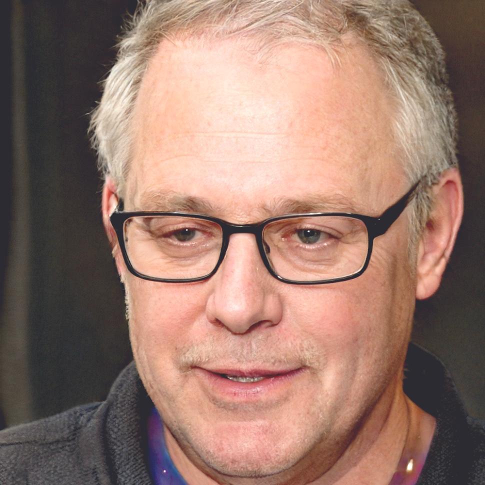 Portrait of satisfied client Cypher sharing his experience with our floral services